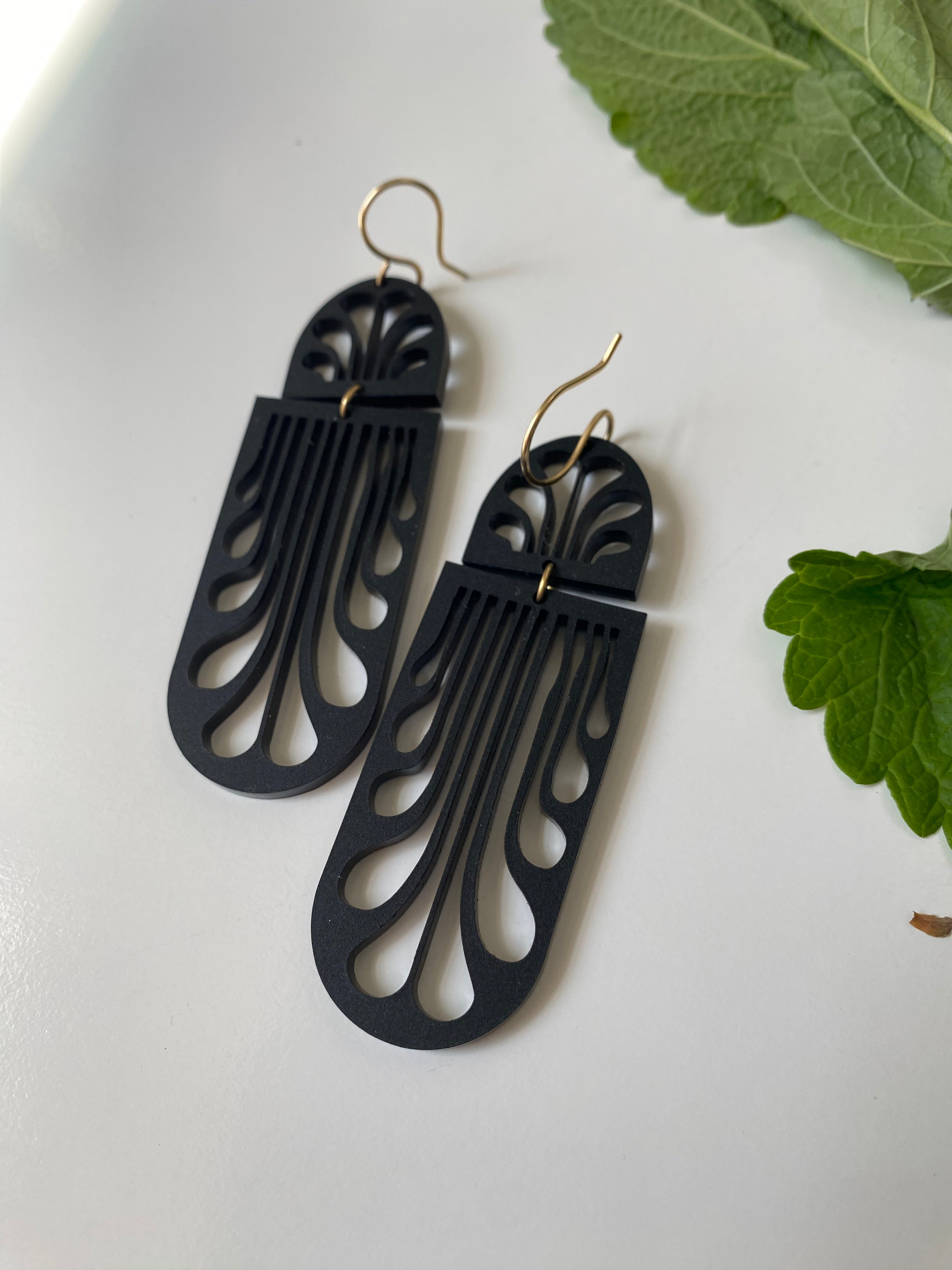 Erté Reflecting Arches Earrings in matte black acrylic