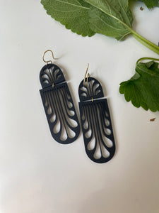 Erté Reflecting Arches Earrings in matte black acrylic