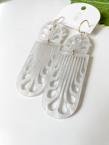 Erté Reflecting Arches Earrings in white, pearl sheen acrylic